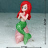 Lifelike mermaid aquarium ornament, handcrafted from non-toxic materials, perfect for enhancing aquatic environments with a whimsical touch. Available at the nearest aquarium in Kukatpally