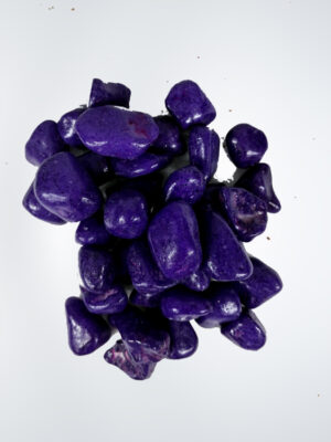 "Close-up of vibrant purple aquarium stones available at Happy Fish and Pet, a local aquarium shop in Kukatpally, showcasing their polished surfaces and suitability for enhancing aquascapes in both freshwater and saltwater tanks."