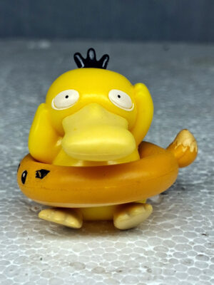 "Pokémon Psyduck Aquarium Figurine displayed at Happy Fish and Pet, a local aquarium shop in Kukatpally, featuring a colorful, non-toxic design ideal for enhancing aquarium decor and providing entertainment for fish."