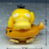 "Pokémon Psyduck Aquarium Figurine displayed at Happy Fish and Pet, a local aquarium shop in Kukatpally, featuring a colorful, non-toxic design ideal for enhancing aquarium decor and providing entertainment for fish."